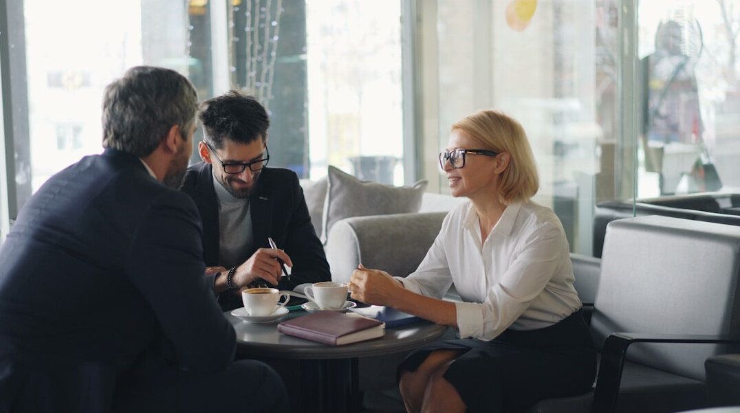 team discussing insurance solutions